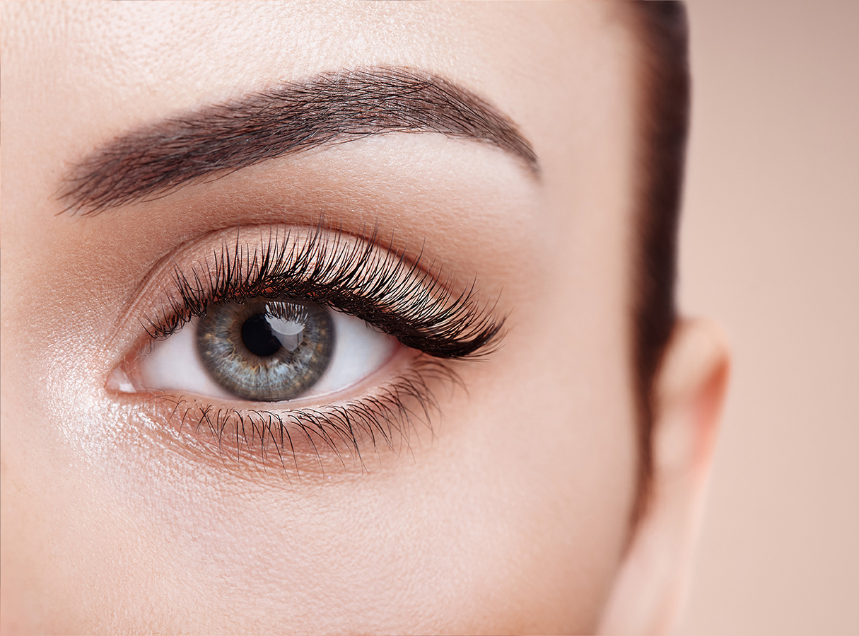 Makeup artist applies skintone. Beautiful woman face. Perfect makeup. Skincare foundation. Sponge makeup artist